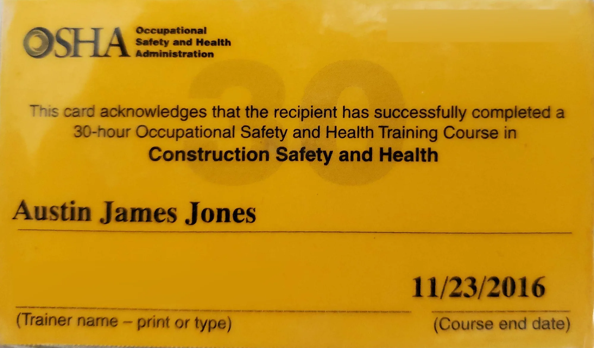 Yellow OSHA 30 card stating that Austin James Jones completed a 30-hour Occupational Safety and Health Training Course in Construction Safety and Health, course end date 11/23/2016, with the card number and trainer line covered for privacy.
